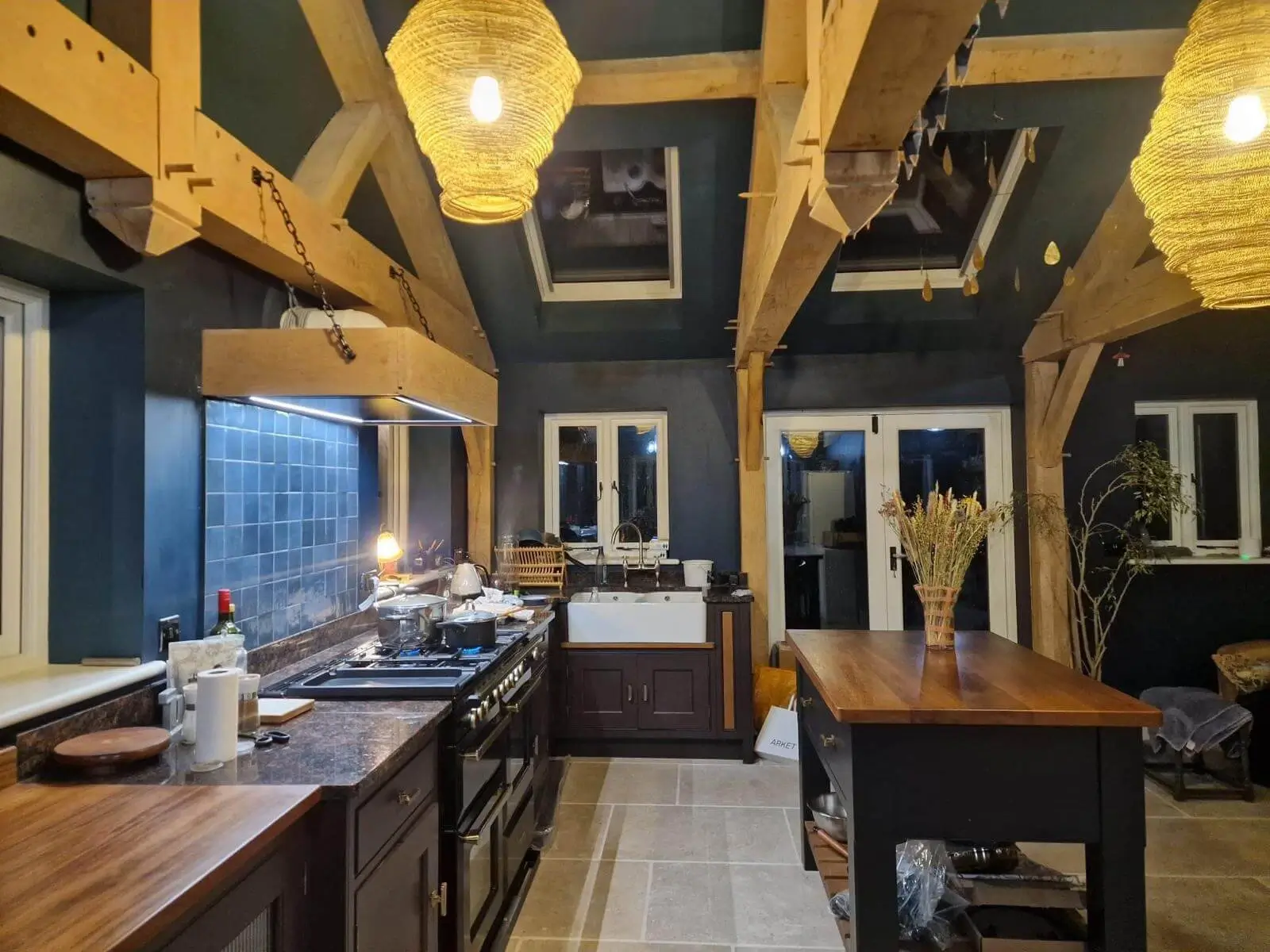 Finished oak framed kitchen with handcrafted timber frame, vaulted ceiling and open-plan living space.