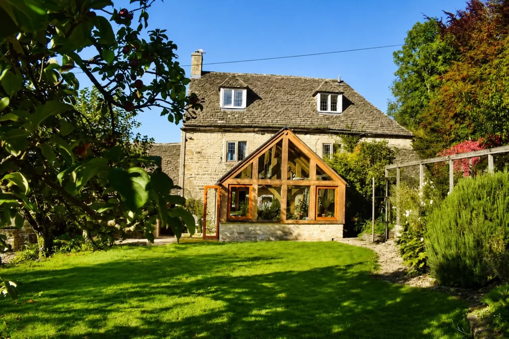 Oak framed orangery design featuring glazed elevations and handcrafted oak detailing