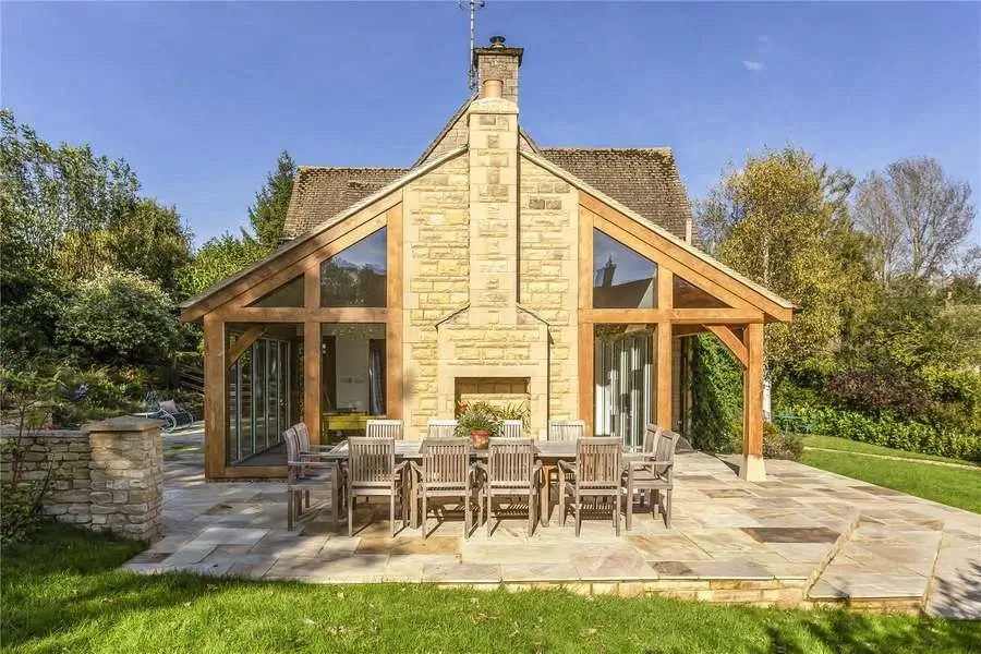 Oak framed sunroom extension designed to maximise natural daylight and garden views